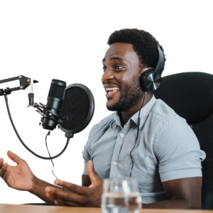 person speaking into a microphone, recording a podcast